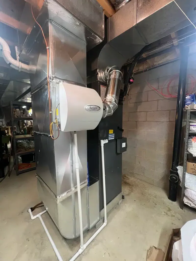 Whole house humidifier and HVAC system in residential home in Akron.