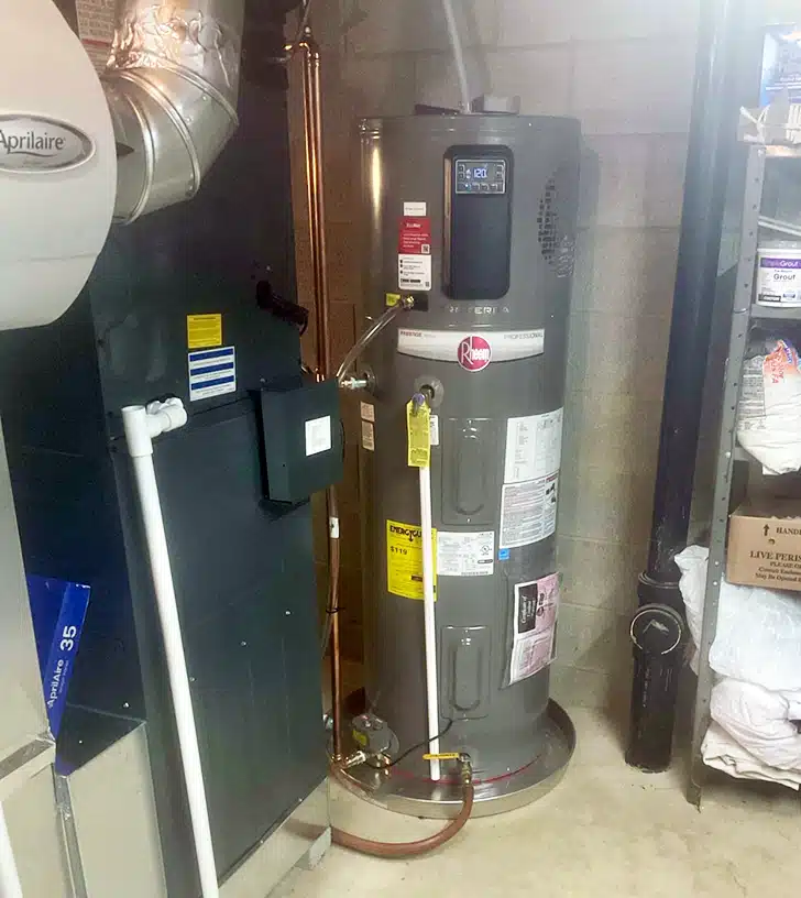 Rheem water heater in basement of Akron home
